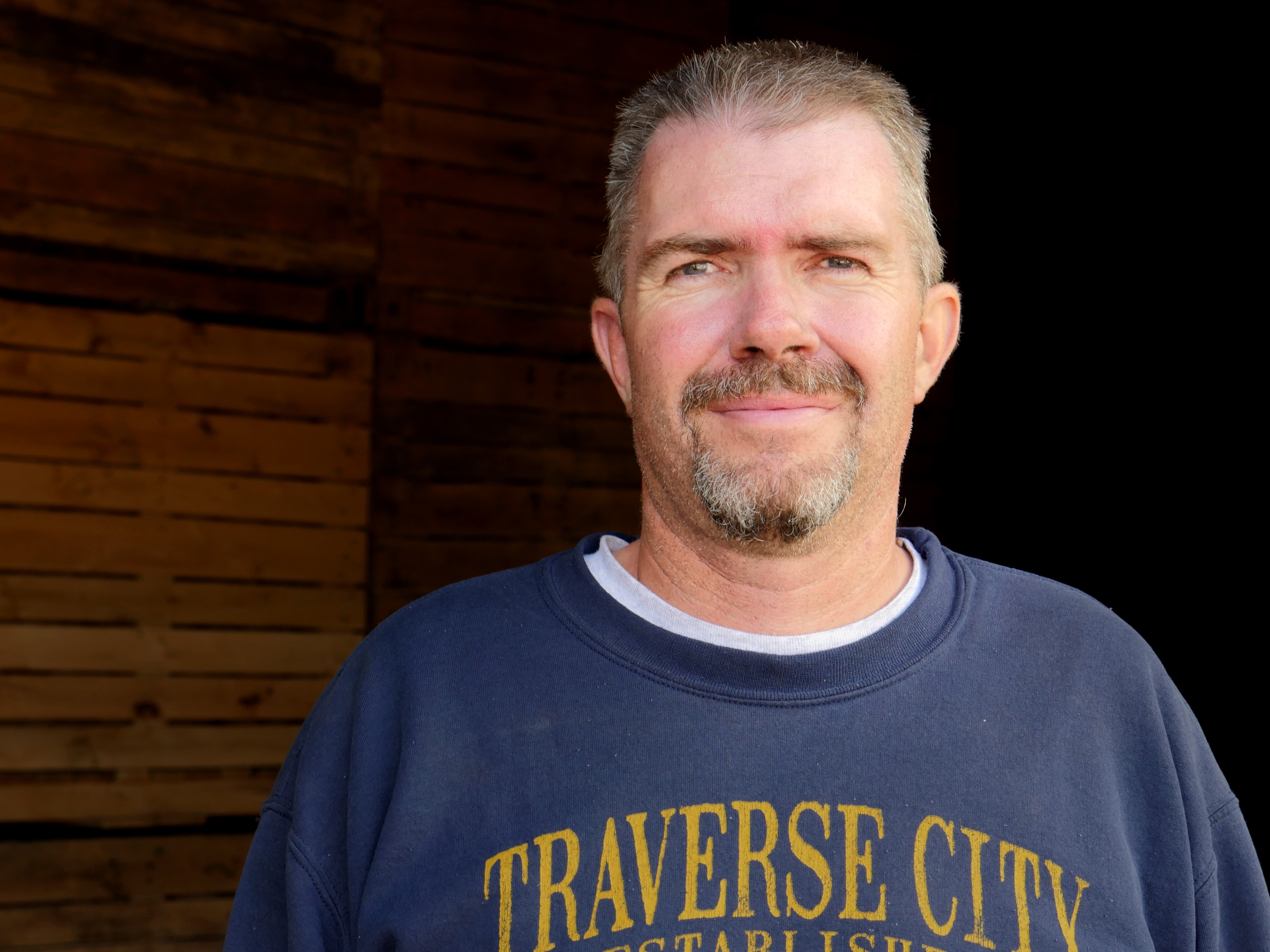 Bruce Cotton, Elmaple farm owner posing